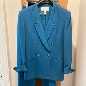 Beautiful Teal colored woman’s suit